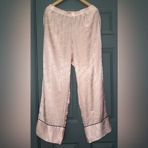 Victoria’s Secret Satin Logo Print Light Pink Pajama Pants.
Size Large